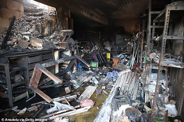Houses across the country, including this one in Krioneri, were left destroyed following a weekend of wildfires