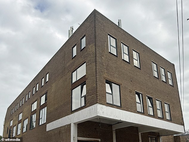 The town could soon have a migrant hotel, pictured, installed above shops in the middle of the high street