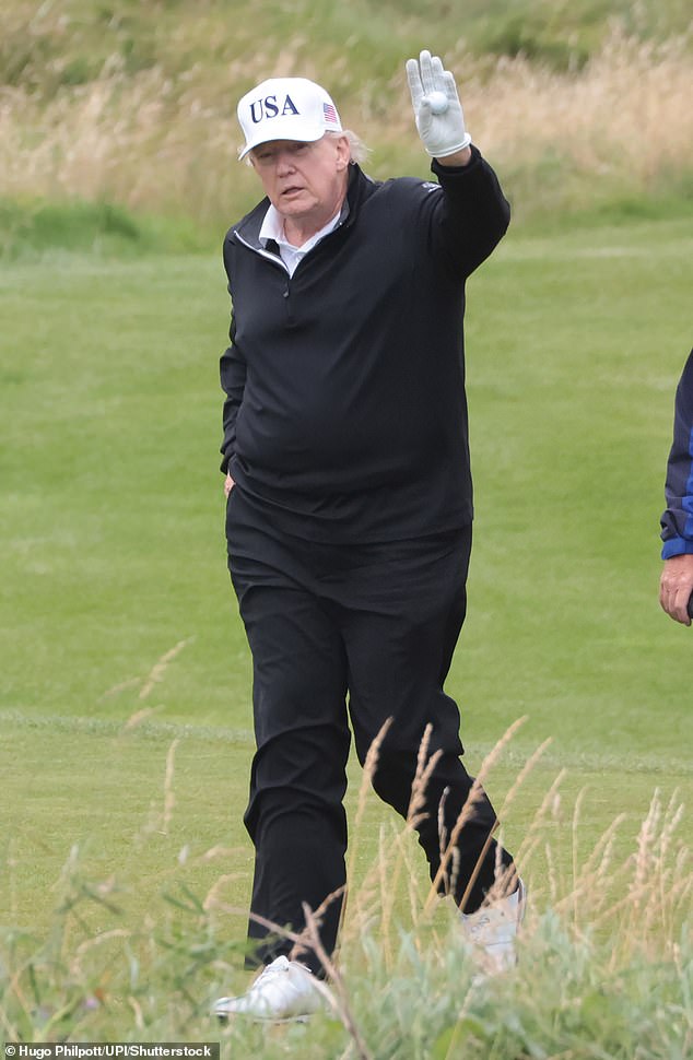 The president wore gloves while playing golf at Turnberry Golf Club in Scotland during his trip