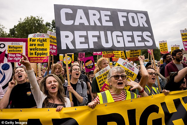 They were on their way home again within three-quarters of hour. Pictured: Stand Up To Racism counter-protesters at The Bell Hotel in Epping, Essex, on July 27, 2025