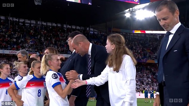 Celebrating their triumph over Spain in the Euros, the England team lined up to shake hands with Prince William and have their medals place round their necks