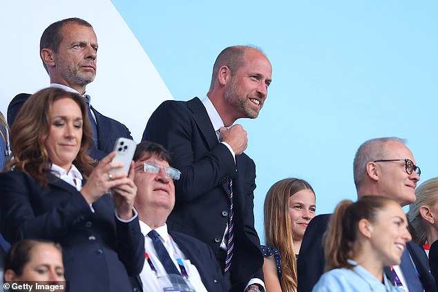 Prince William also looked gleeful as they watched the match together