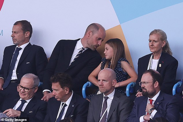 They put their heads together to discuss the action in front of them at several points (pictured)