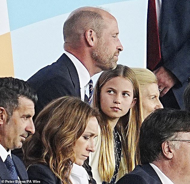 She gave her football fan dad an adoring look as they showed their close bond
