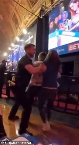The spectators were seemingly dragged out by security in Blackpool