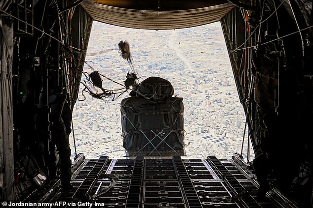 Aid is dropped into Gaza by the Royal Jordanian Armed Forces from a C-130 on July 27, 2025