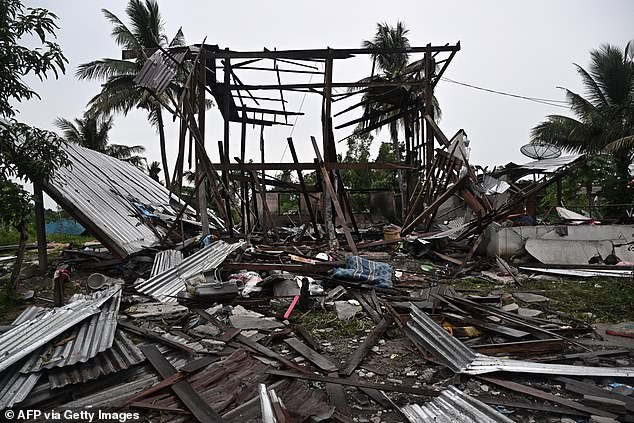 An evacuated house that was destroyed by fire after being hit by Cambodian artillery that morning, is seen in the Thai border province of Surin on July 27, 2025