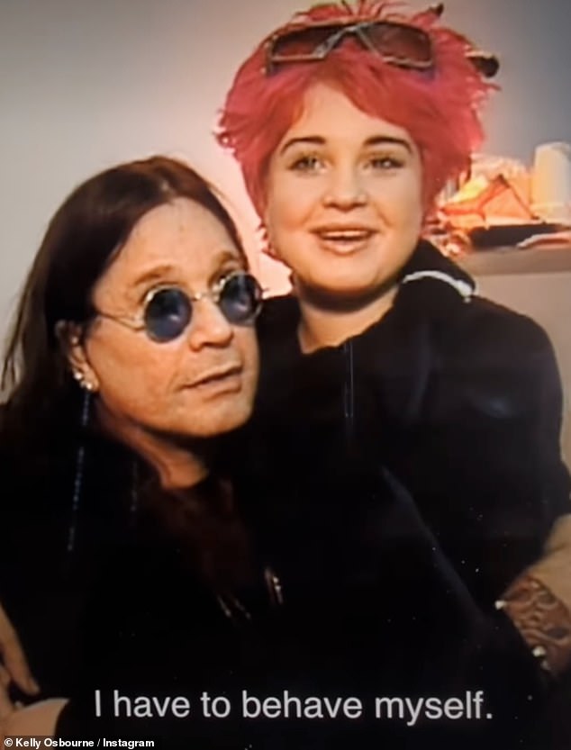Perched on Ozzy's knee in a brief clip, Kelly appears to reference his notoriously colourful use of the English language after telling an accompanying camera crew: 'I can't say f**k'