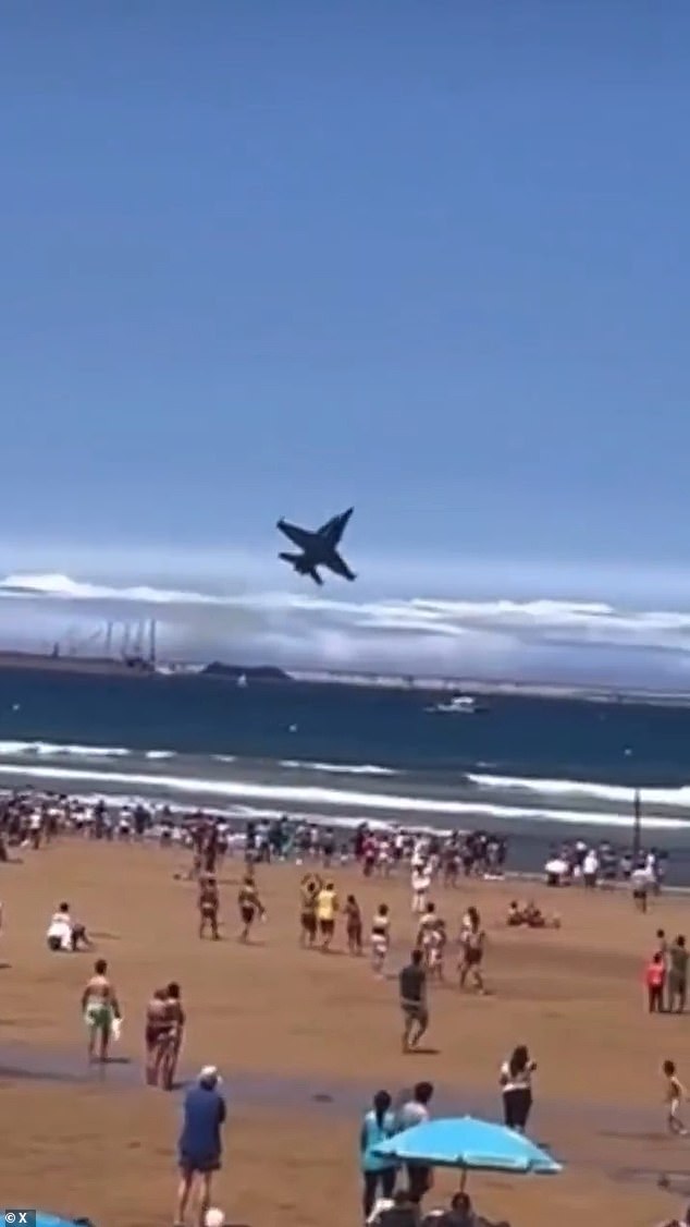 After the Spanish Air Force EF-18 Hornet fighter jet executes an acrobatic stunt, the plane can be seen heading close to the sea