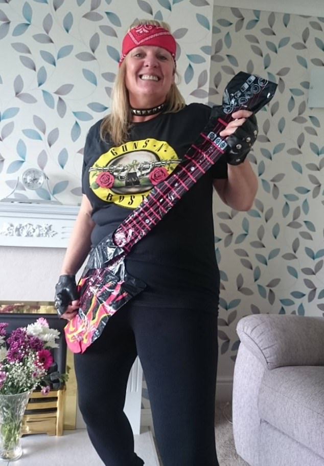 Another picture showed her playing air guitar - Michael lives with James's stepmother in Northampton