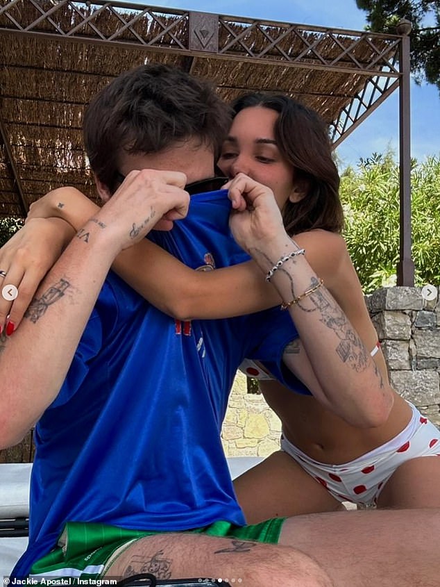 The lovebirds looked happier than ever as they packed on the PDA