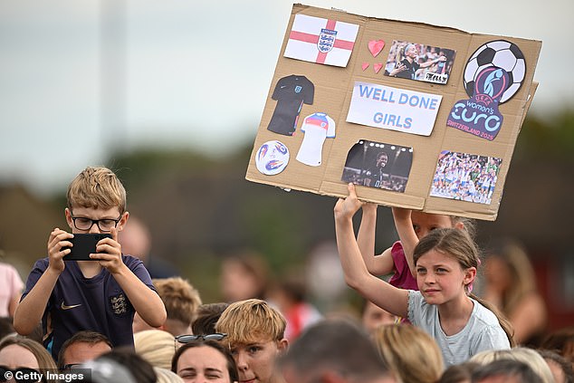 Despite being told to stay away, fans flocked to the airport to welcome the returning heroes