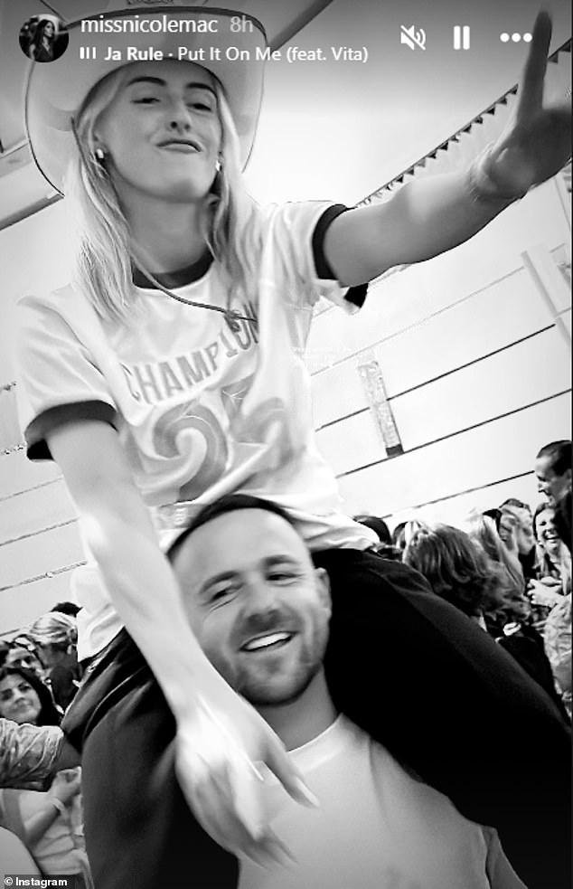 Nicole Mac, Chloe Kelly's agent, shared this fun-filled photo of the beaming champion with husband Scott on her Instagram page
