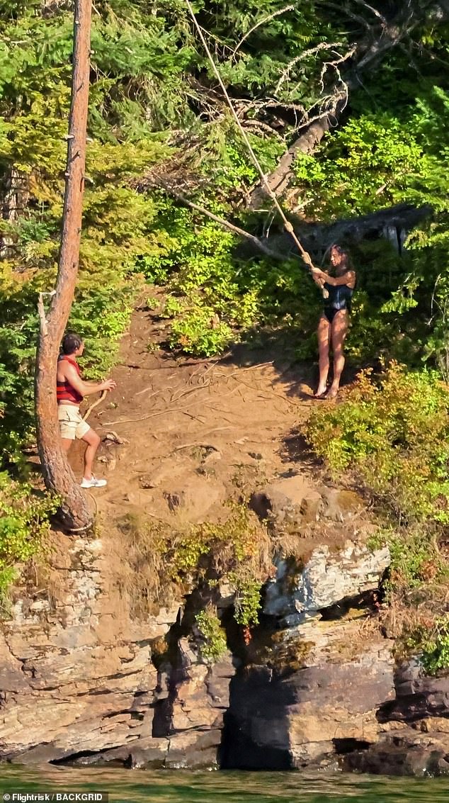 Away from the crowd, the pair shared a special moment while having fun at the lakeside home she purchased for her mother, a property that had been in their family for generations before it was lost in foreclosure