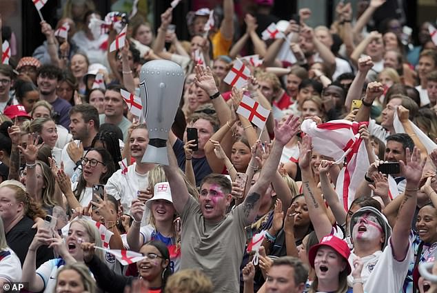 The final is already the most-watched TV moment of the year despite only partial viewing figures being available (pictured: fans watching at Boxpark Croydon)