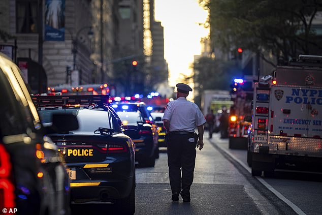 A security alert told employees to 'secure your location and hide' until police clear the floor