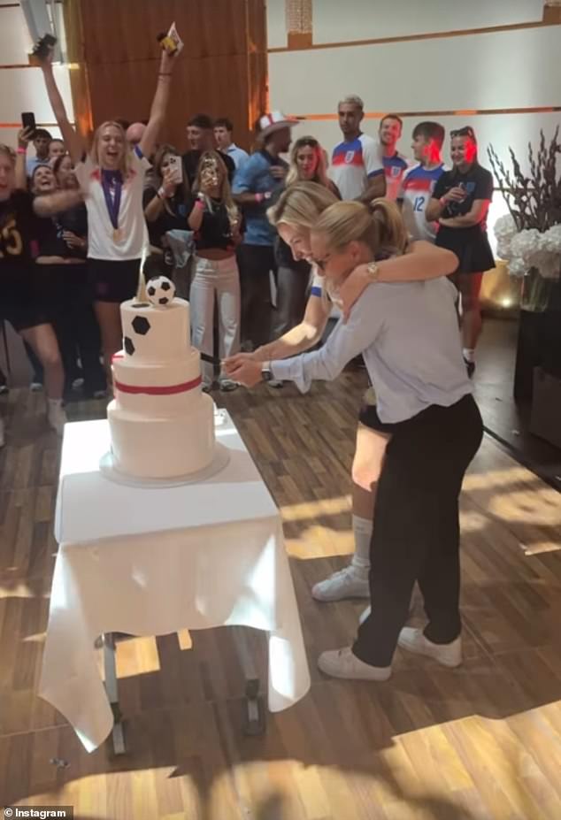 England manager Sarina Wiegman and captain Leah Williamson cut a celebratory cake