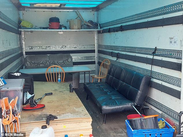 During a raid in Oldham, immigration Enforcement officers found makeshift shipping containers that had been turned into a kitchen and living room