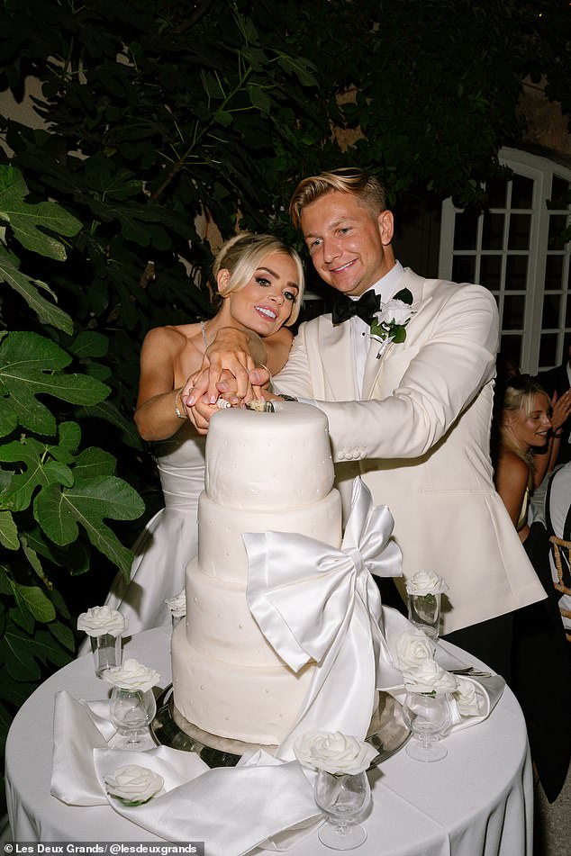 Ellie, 31, tells me: 'We definitely felt like this was our real wedding. We got married in a church, we exchanged rings, and we literally "tied the knot"'