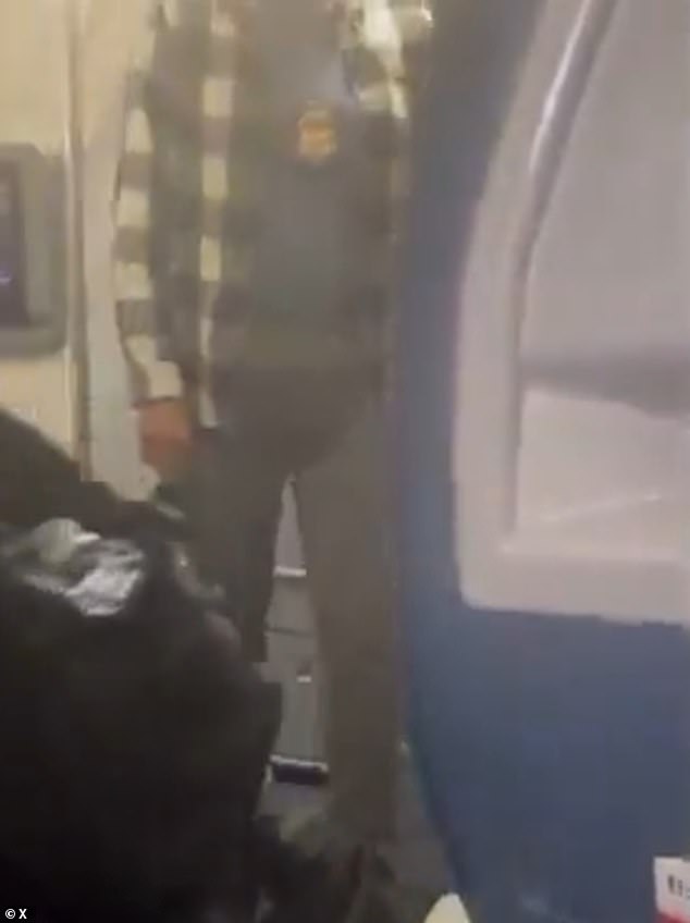 The agents were seen wearing law enforcement badges around their necks and their faces cropped out of the footage shared online