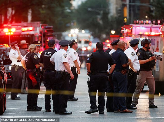 The hero NYPD cop shot and killed in the Manhattan mass shooting Monday was working a second job in private security while his wife expected the couple's third child