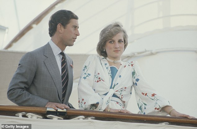Charles and Diana are pictured on board