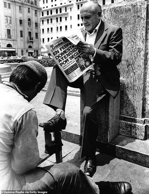 Barbie having his shoes shined in Lima, Peru, in 1972