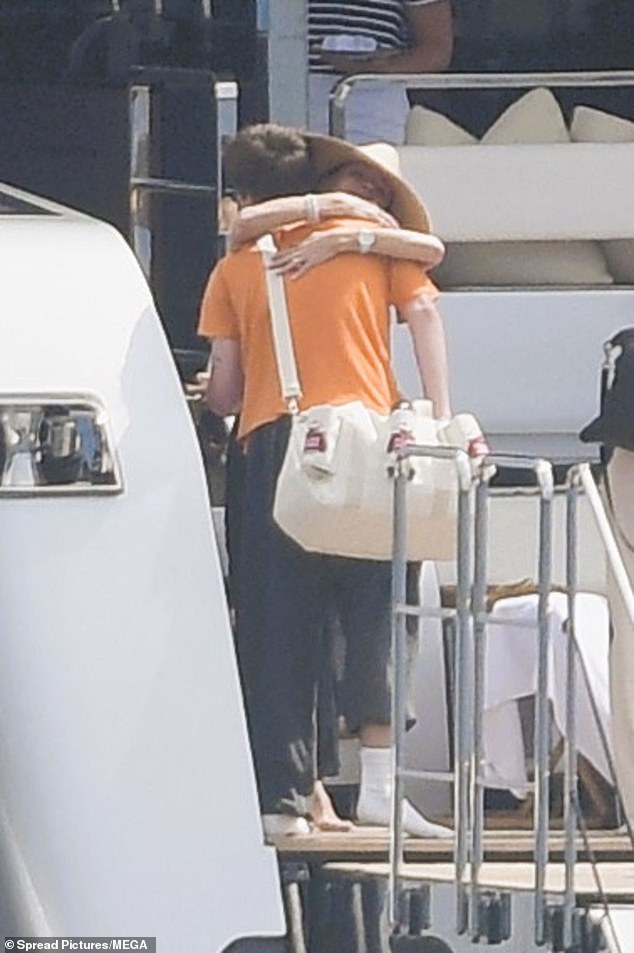 Victoria tightly hugged her youngest son Cruz as he boarded the yacht