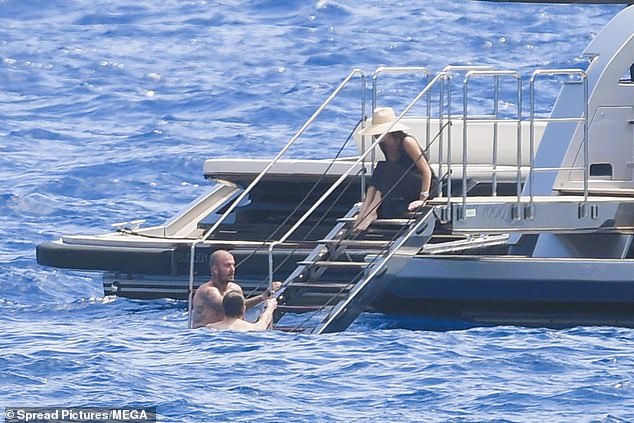 After a swim, David and Cruz climbed up the stairs to chat to Victoria