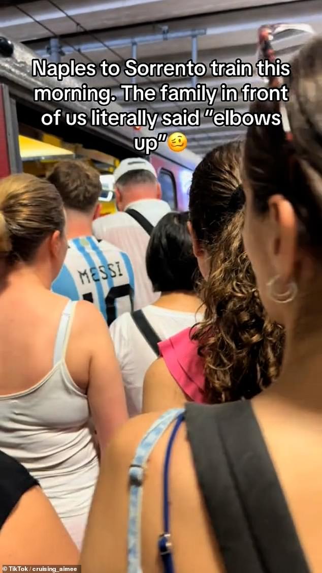 A tourist on a train from Naples to Sorrento filmed a packed carriage and complained the crowding was so 'crazy' she was told 'elbows up' to make more room