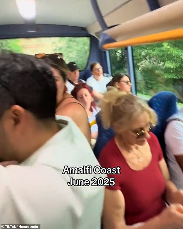 Pictured: Passengers on a crowded bus on the Amalfi coast