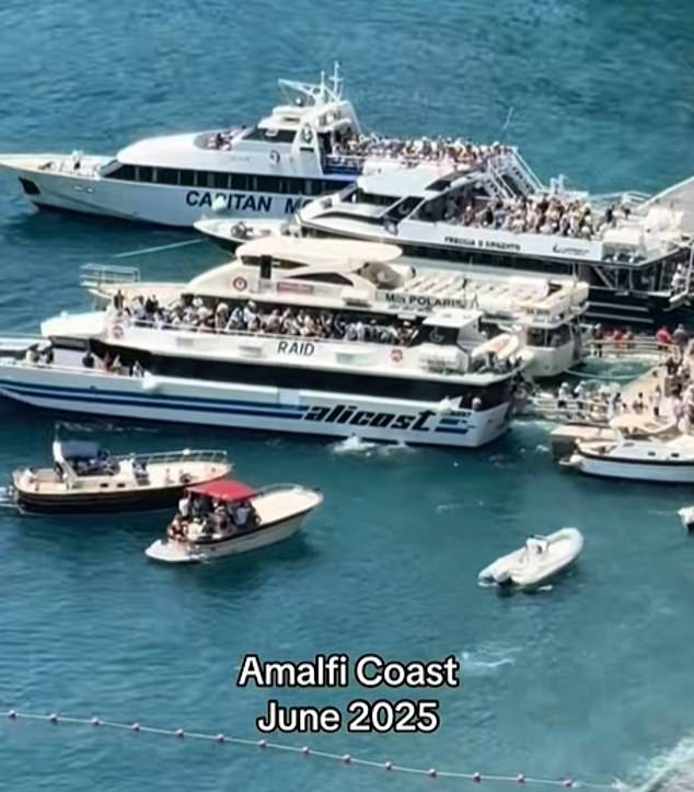 Pictured: Boats in Amalfi packed with passengers
