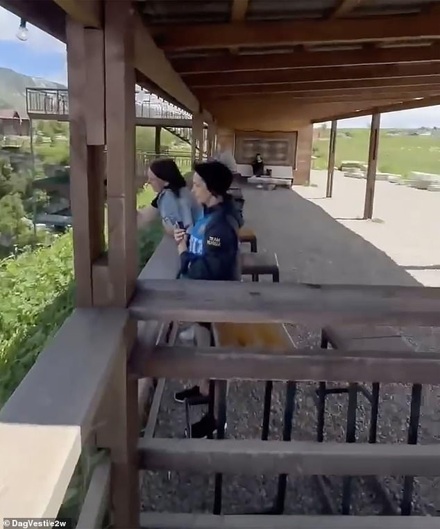 People are heard laughing as the ass sped downwards on the zipline which is reportedly more than 100 metres long [328ft]