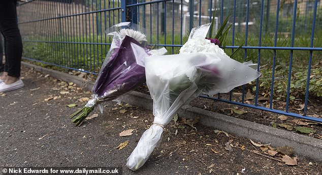 Floral tributes have been left at the scene in Bermondsey, south London