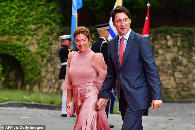 Trudeau shares three children with ex wife Sophie Grégoire Trudeau, from whom he announced a split in August 2023 after 18 years of marriage - pictured 2022