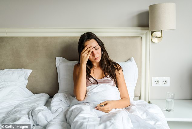 A migraine is a neurological condition that causes severe throbbing pain or a pulsing sensation, usually on one side of the head (stock image)