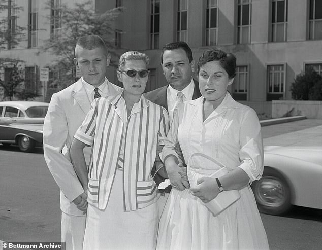Amid the mystery, his family still holds out hope that his body will one day be found. (Pictured from left: son James Hoffa Jr., wife Josephine Hoffa, family friend Charles O'Brien, daughter Barbara Crancer)