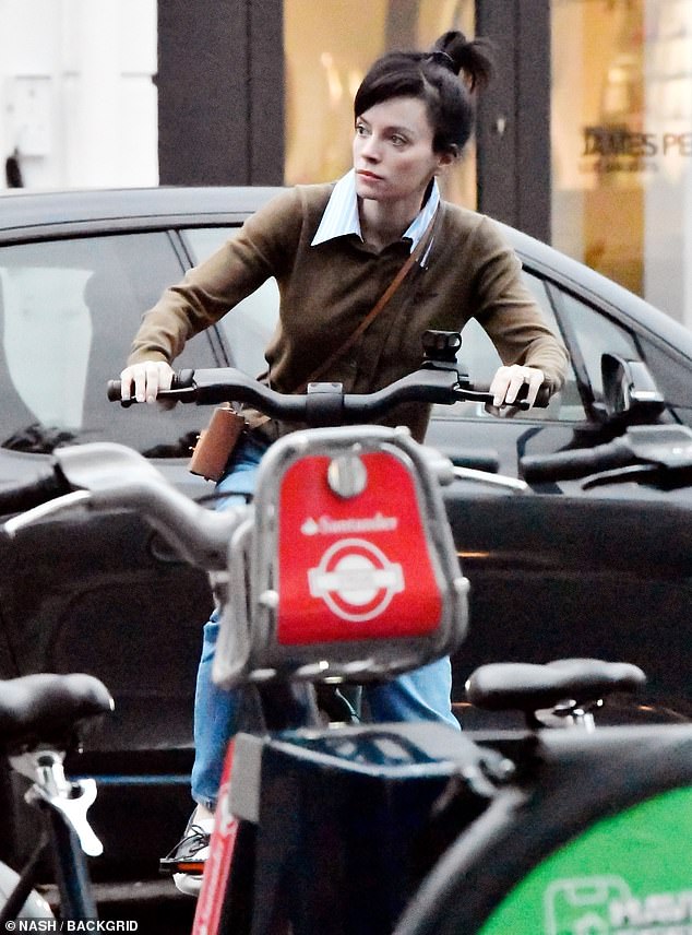 Lily, who is believed to be single and recently enjoyed a date with James Norton, toted her essentials in a crossbody brown handbag and