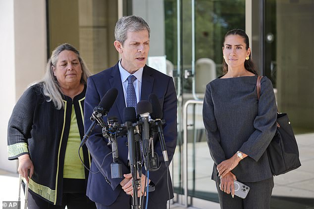 David Markus, attorney for Ghislaine Maxwell, center, speaks during a news conference outside the federal courthouse in Tallahassee, Fla., Thursday, July 24, 2025
