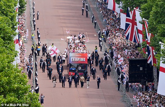 The team was paraded down the Mall by two Armed Forces bands, who played familiar pop songs associated with the team including Sweet Caroline