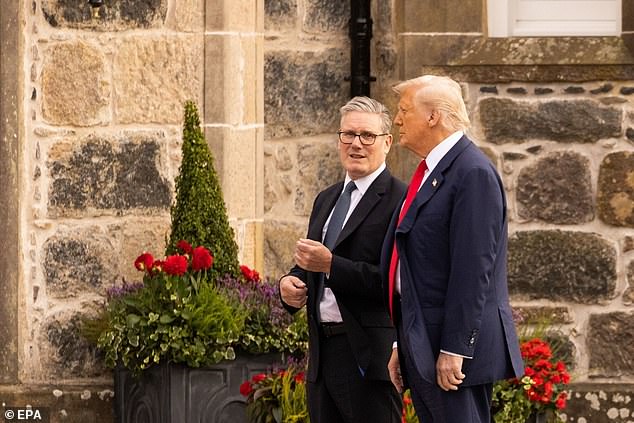 Donald Trump (R) and Keir Starmer (L) arrive at the Trump International Golf Links course in Aberdeen on Monday