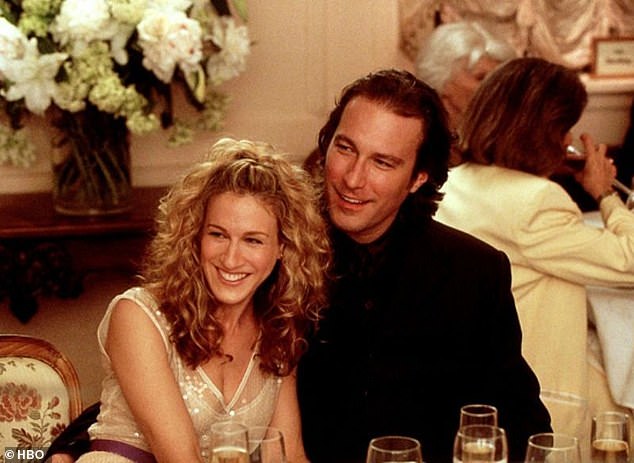 Davis starred alongside Sarah Jessica Parker, Kim Cattrall and Cynthia Nixon as the show's central group of friends; pictured: Sarah Jessica Parker and John Corbett in series still