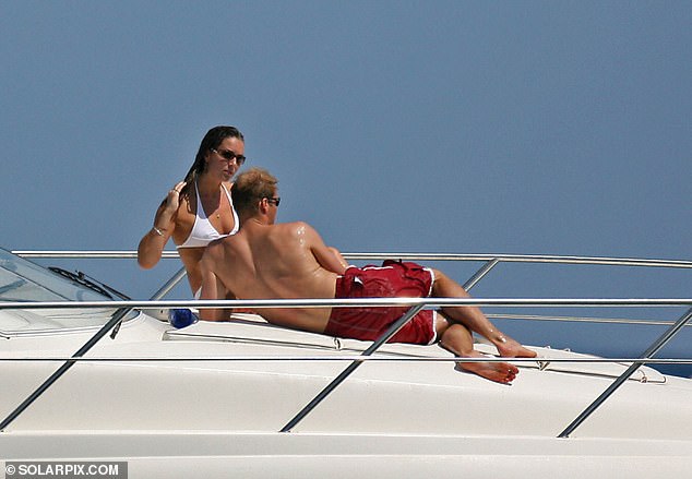 A taverna waiter in the pretty fishing village of Agia Efimia, where the Opera dropped anchor, tells me the royals were taken to the harbour by tender boat. Pictured: Prince William and then girlfriend Kate Middleton relaxing with friends on a boat in Ibiza in September 2006 aboard her uncle Gary Goldsmith's yacht