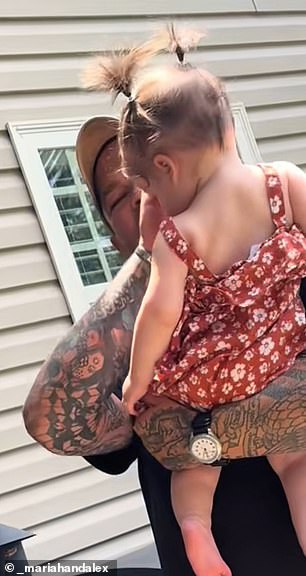 Despite looking at her face multiple times, fixing her hair, and giving her a kiss, Alex did not realize that the baby he was holding was not his own offspring