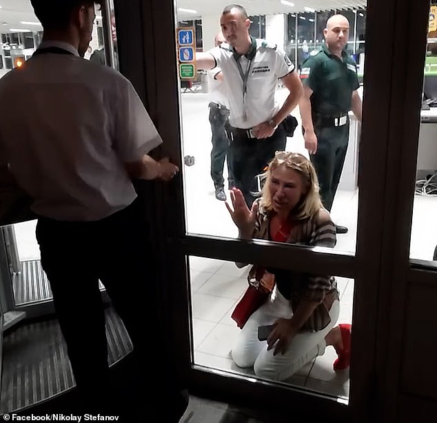 Tsvetana Kalinina, 55, was filmed sobbing and banging on a door at Sofia Airport in Bulgaria after being told her she could not board due to her 'over-sized bag'