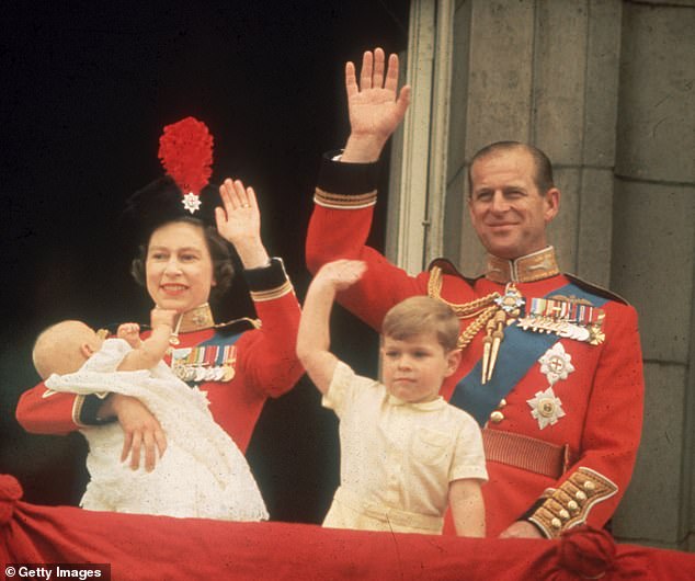 The Queen and Prince Philip on the balcony of Buckingham Palace with a baby Prince Edward and Prince Andrew during Trooping the Colour