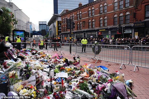 Police and barriers are seen along Black Sabbath Bridge in Birmingham on Wednesday morning