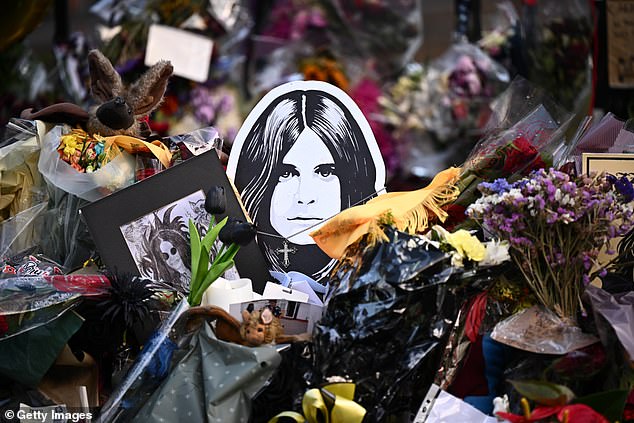 Tributes are left before Ozzy Osbourne's cortege journey through his home city Birmingham