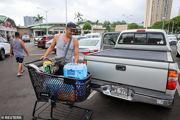 Some residents were seen stocking up on essentials after the government issued its warnings