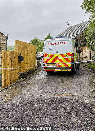 Police cordon at Carr Farm, in Milnrow, Rochdale, on May 16, 2025, the day after Daniel Twigg was killed